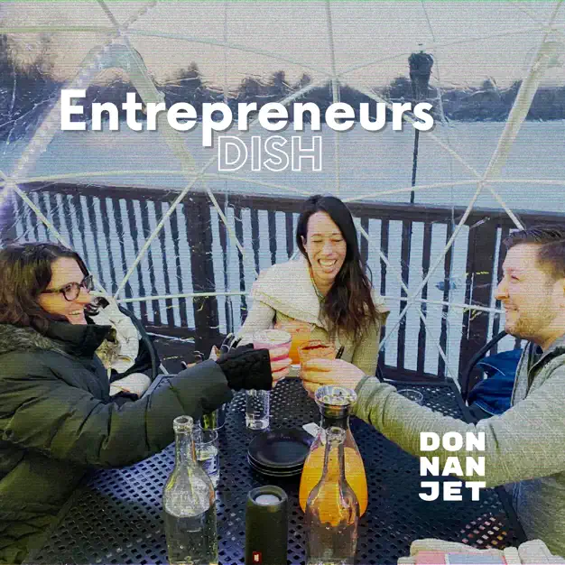 photo of three podcast co-hosts seated at an outdoor table raising waterglasses